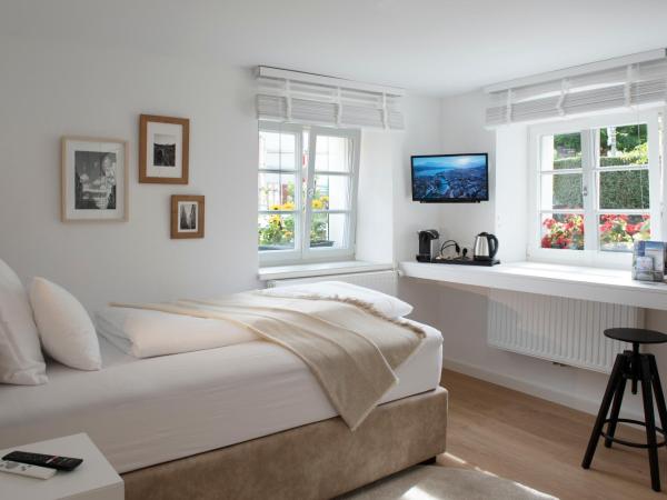 Quartier 99 : photo 1 de la chambre grande chambre simple