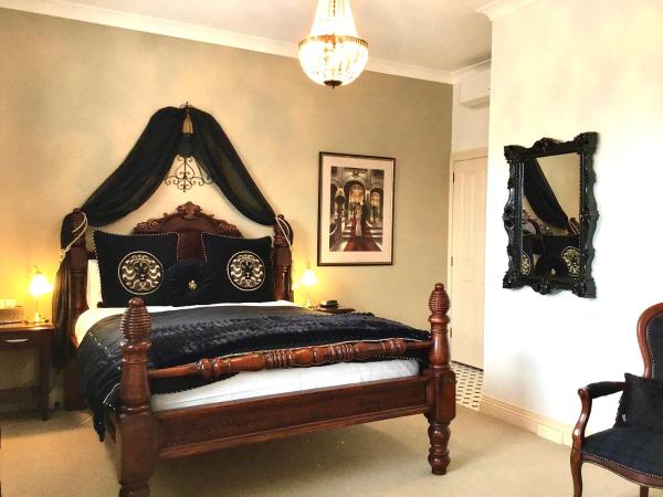 Kurrajong House : photo 2 de la chambre  chambre lit queen-size benjamin - vue sur jardin