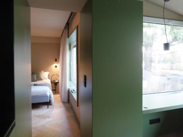 Oporto CoLiving Circunvalação 13250 : photo 4 de la chambre chambre double avec salle de bains privative