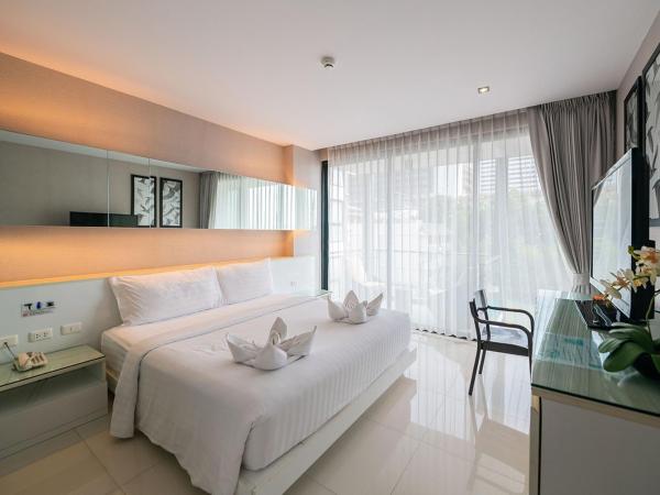 Serenotel Pattaya : photo 9 de la chambre chambre double deluxe - vue partielle sur mer