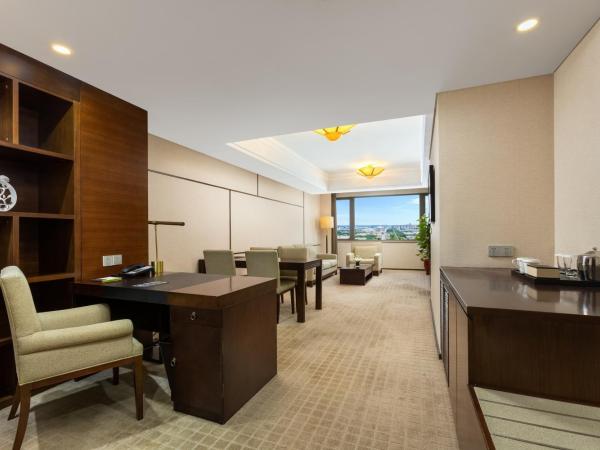 Millennium Hotel Wuxi : photo 2 de la chambre suite affaires