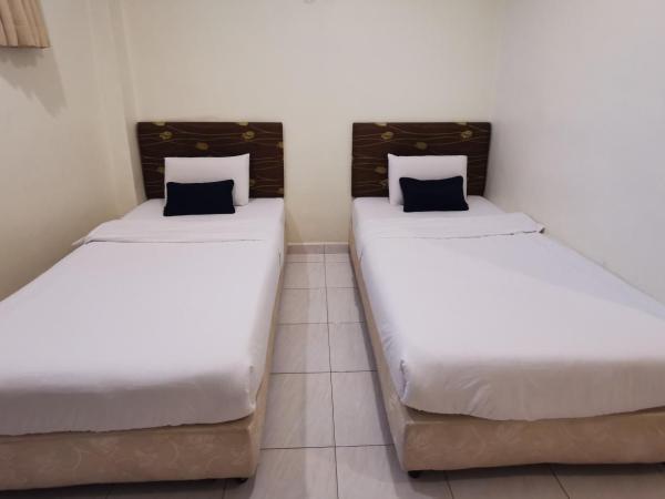 Hotel Bandar Baru Menglembu : photo 1 de la chambre chambre lits jumeaux standard