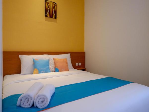 Sans Hotel Pippo Yogyakarta by RedDoorz : photo 7 de la chambre chambre double supérieure