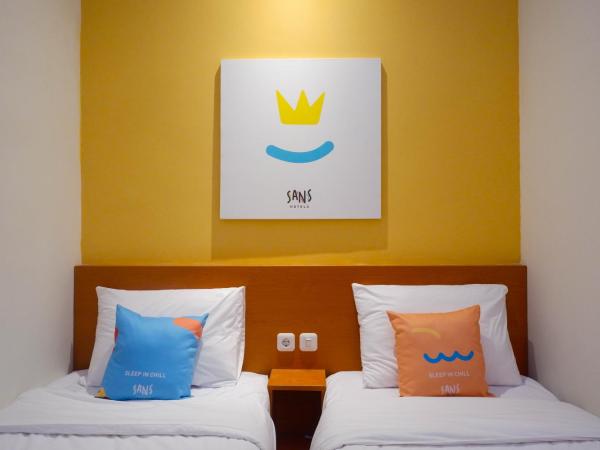 Sans Hotel Pippo Yogyakarta by RedDoorz : photo 2 de la chambre chambre lits jumeaux supérieure