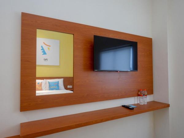 Sans Hotel Pippo Yogyakarta by RedDoorz : photo 6 de la chambre chambre familiale