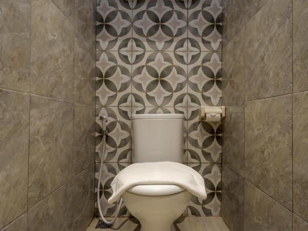 Sans Hotel Pippo Yogyakarta by RedDoorz : photo 5 de la chambre chambre lits jumeaux supérieure