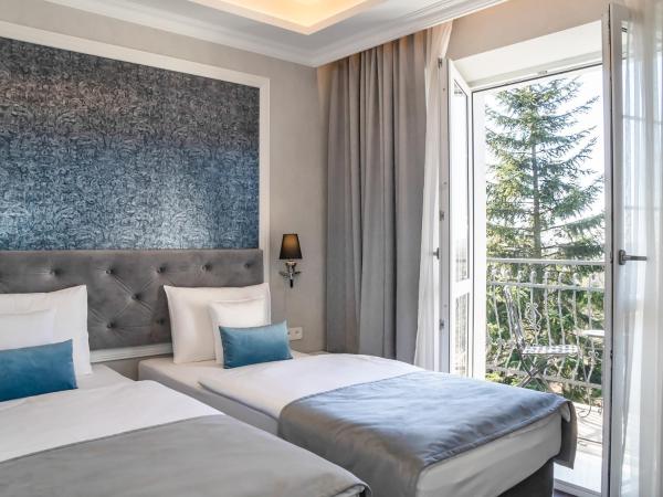 Merci Boutique Hotel : photo 1 de la chambre chambre lits jumeaux