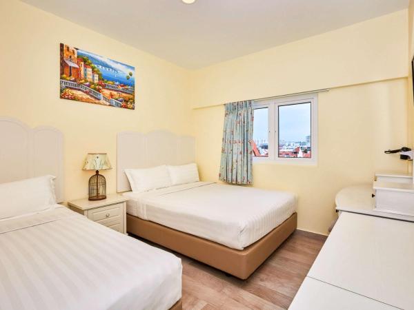 ibis budget Singapore Joo Chiat : photo 1 de la chambre chambre triple supérieure
