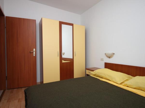 Apartments and rooms with parking space Novalja, Pag - 6341 : photo 6 de la chambre appartement 2 chambres avec terrasse et vue sur la mer