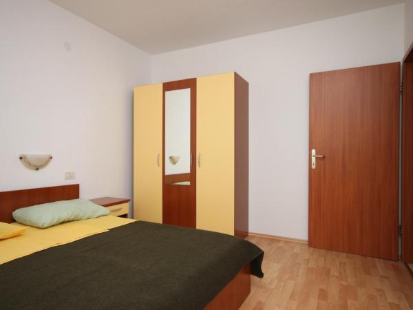 Apartments and rooms with parking space Novalja, Pag - 6341 : photo 4 de la chambre appartement 2 chambres avec terrasse et vue sur la mer