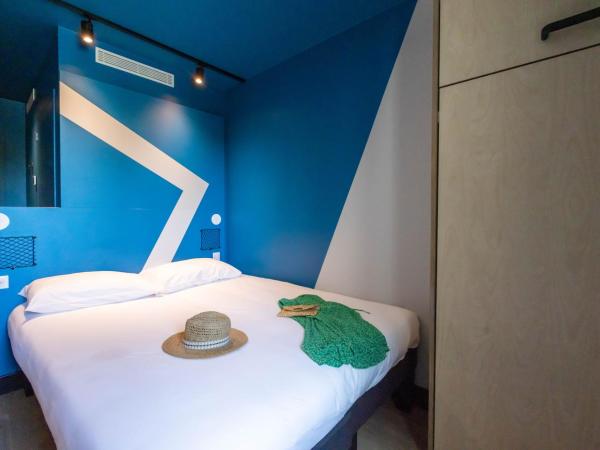 ibis Budget La Rochelle Centre : photo 5 de la chambre chambre avec 1 lit double et 1 lit simple