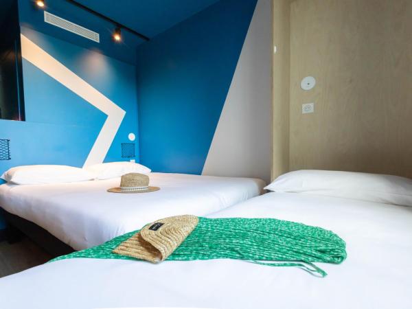 ibis Budget La Rochelle Centre : photo 5 de la chambre chambre avec 1 lit double et 1 lit simple