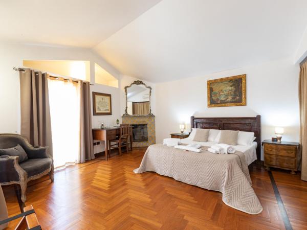 Residenza Kastrum : photo 4 de la chambre suite deluxe avec baignoire spa