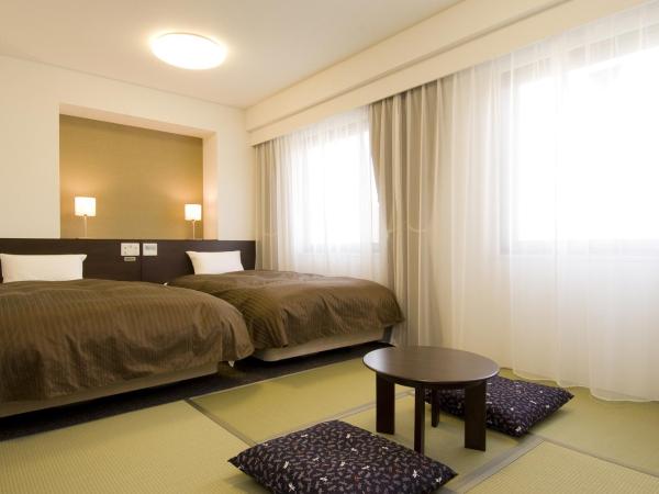 Dormy Inn Hakata Gion : photo 1 de la chambre chambre quadruple Étage club avec coin tatami