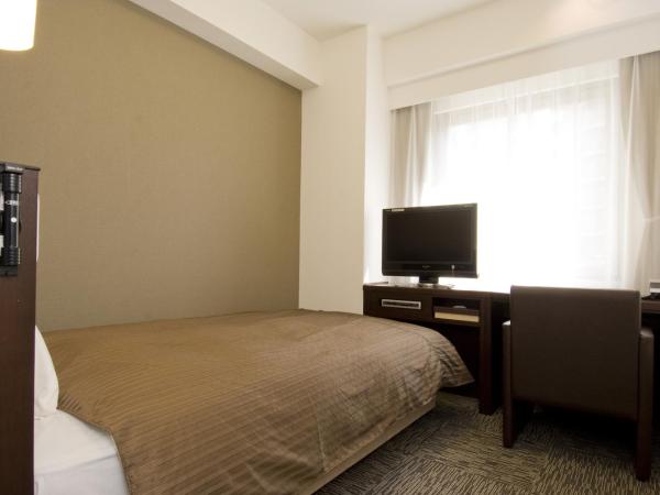 Dormy Inn Hakata Gion : photo 1 de la chambre chambre simple avec salle de bains commune