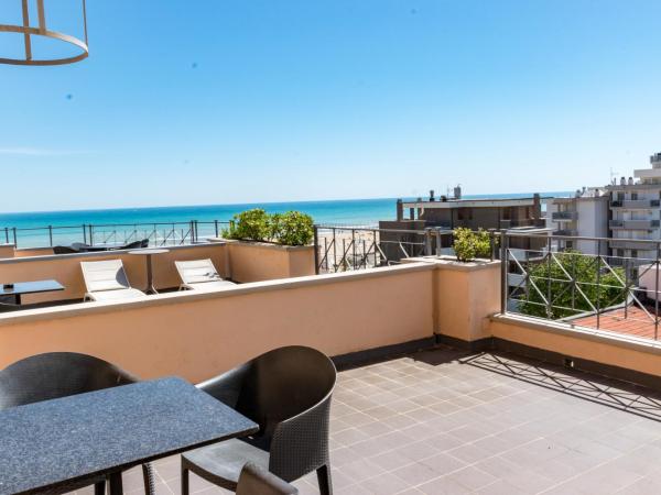 Hotel Nettunia : photo 10 de la chambre chambre double ou lits jumeaux deluxe - vue sur mer