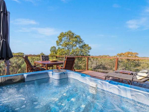 The Oasis Apartments and Treetop Houses : photo 2 de la chambre maison 2 chambres avec bain à remous - cime des arbres (bécassine)