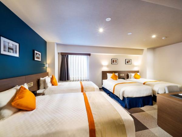 Best Western Plus Fukuoka Tenjin-minami : photo 1 de la chambre quadruple room with four single beds