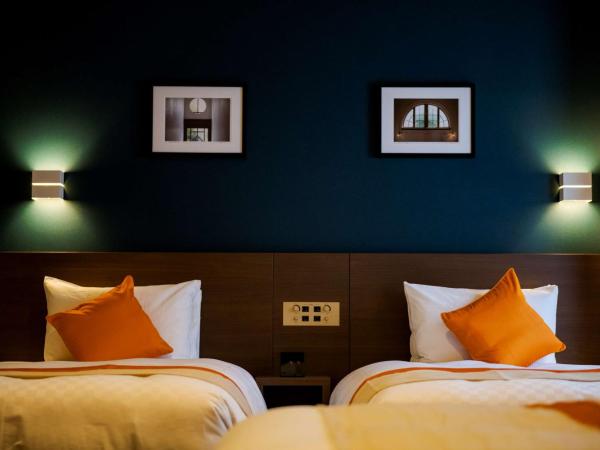 Best Western Plus Fukuoka Tenjin-minami : photo 4 de la chambre quadruple room with four single beds