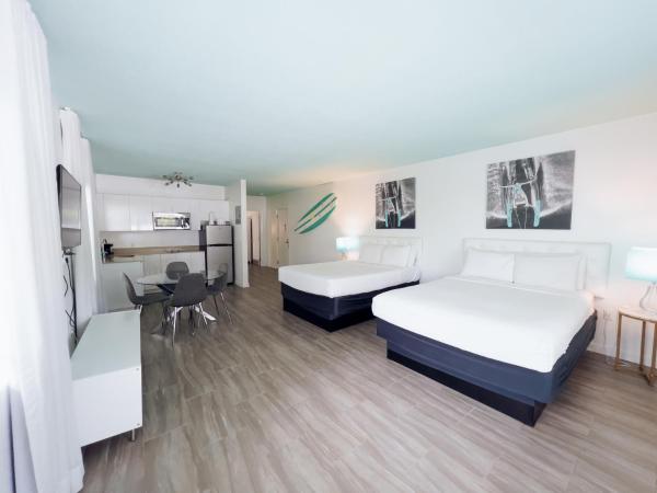 Aqua Hotel : photo 1 de la chambre suite 1 chambre avec 2 lits queen-size