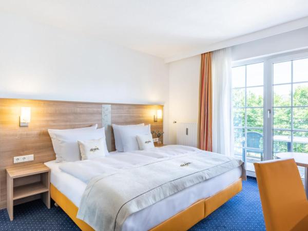 acora Düsseldorf Living the City : photo 1 de la chambre chambre double ou lits jumeaux