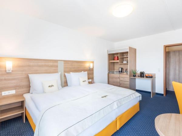 acora Düsseldorf Living the City - Apartments : photo 1 de la chambre appartement supérieur