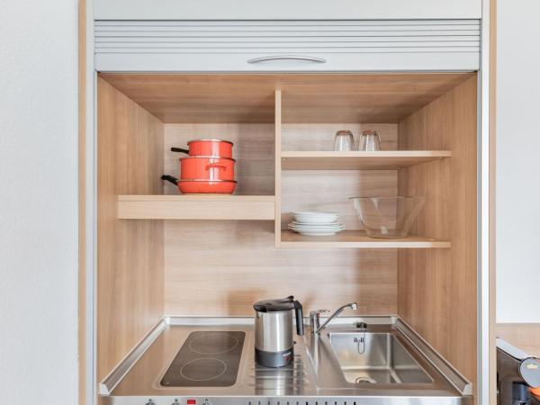 acora Düsseldorf Living the City - Apartments : photo 3 de la chambre appartement supérieur