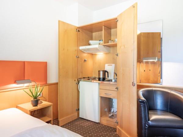 acora Düsseldorf Living the City - Apartments : photo 2 de la chambre appartement supérieur