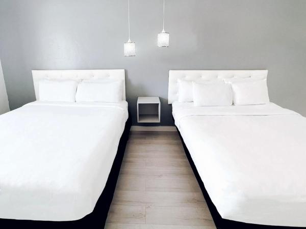 North Beach Hotel : photo 3 de la chambre chambre de luxe avec 2 lits queen-size