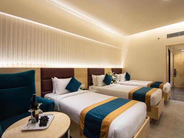 Zion - A Luxurious Hotel : photo 5 de la chambre chambre triple exécutive