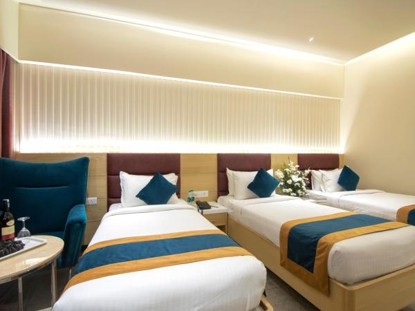 Zion - A Luxurious Hotel : photo 4 de la chambre chambre triple exécutive