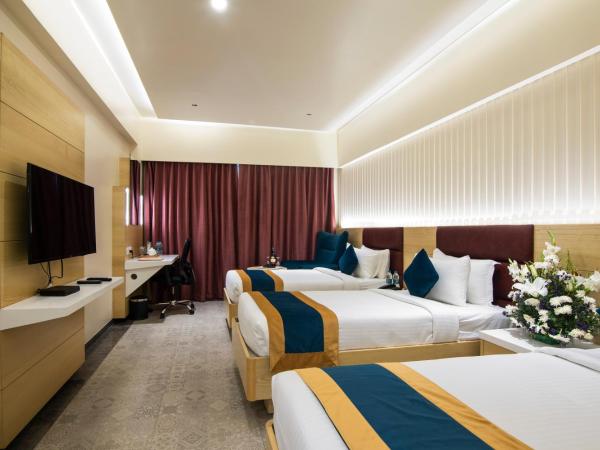 Zion - A Luxurious Hotel : photo 2 de la chambre chambre triple exécutive