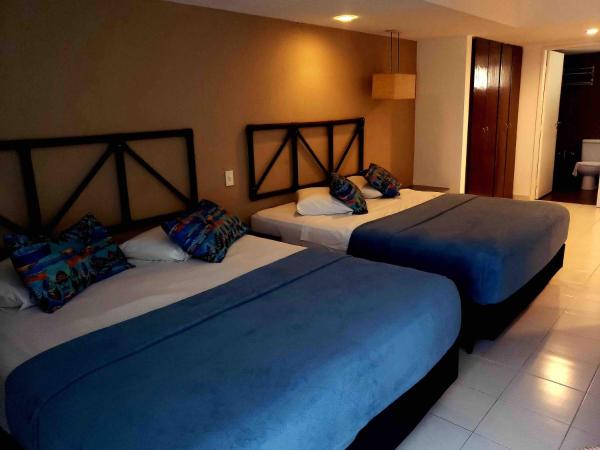 Vila do Mar Natal - All Inclusive : photo 9 de la chambre suite lit queen-size avec baignoire spa