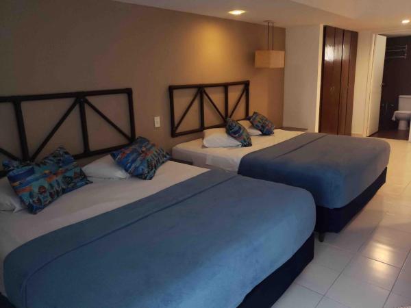Vila do Mar Natal - All Inclusive : photo 10 de la chambre suite lit queen-size avec baignoire spa