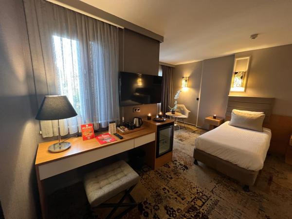 All Seasons Hotel : photo 10 de la chambre chambre familiale