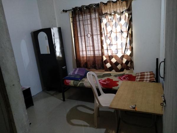 Professionals Pride PG : photo 2 de la chambre chambre simple avec salle de bains privative