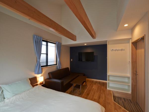 Guesthouse Soi : photo 2 de la chambre chambre lit queen-size avec canapé-lit