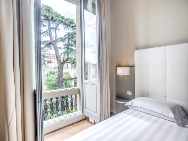 Hotel Ariele : photo 1 de la chambre chambre double ou lits jumeaux supérieure - vue sur jardin