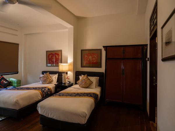 Hotel Penaga : photo 4 de la chambre chambre lits jumeaux hutton deluxe avec jacuzzi