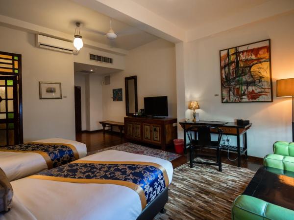 Hotel Penaga : photo 10 de la chambre chambre lits jumeaux hutton deluxe avec jacuzzi