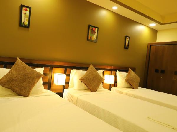 KANS ONE - Madipakkam : photo 5 de la chambre chambre triple