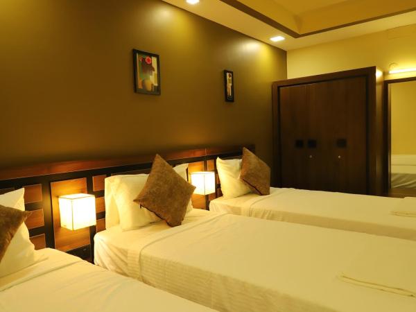 KANS ONE - Madipakkam : photo 3 de la chambre chambre triple