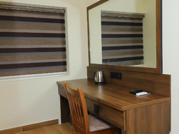 KANS ONE - Madipakkam : photo 8 de la chambre chambre lit king-size