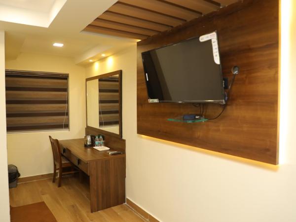 KANS ONE - Madipakkam : photo 7 de la chambre chambre lit king-size