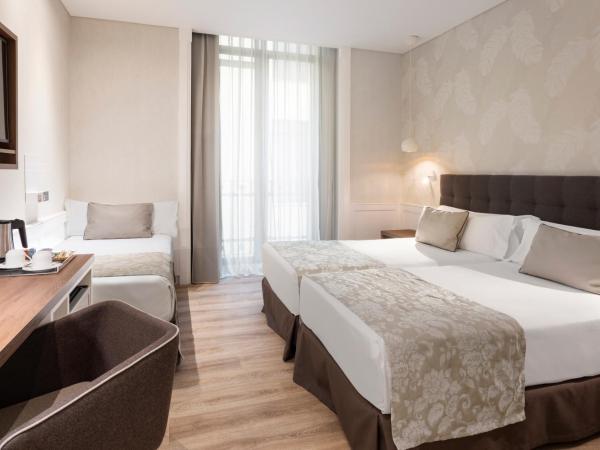 Catalonia Puerta del Sol : photo 1 de la chambre chambre triple