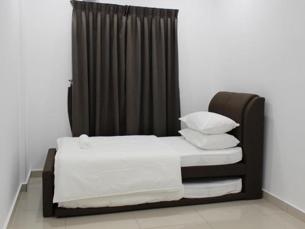 Jomstay Manhattan Suites Ipoh Water Park Homestay : photo 1 de la chambre appartement avec balcon