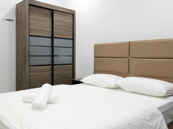 Jomstay Manhattan Suites Ipoh Water Park Homestay : photo 5 de la chambre appartement avec balcon