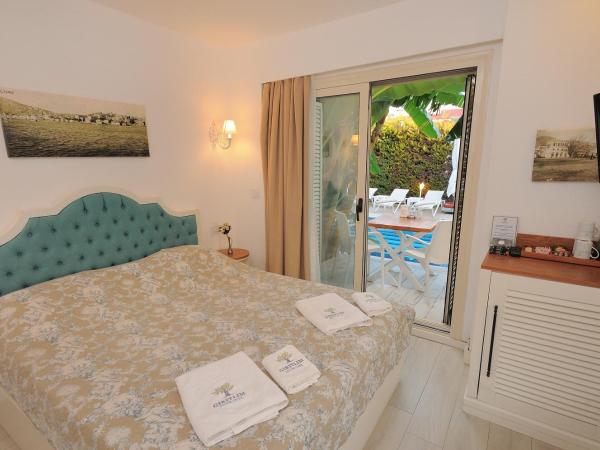 GİRİTLİM BUTİK OTEL : photo 1 de la chambre chambre triple deluxe