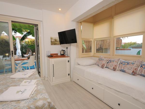 GİRİTLİM BUTİK OTEL : photo 2 de la chambre chambre triple deluxe