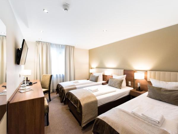 Arena am Zoo : photo 2 de la chambre chambre triple